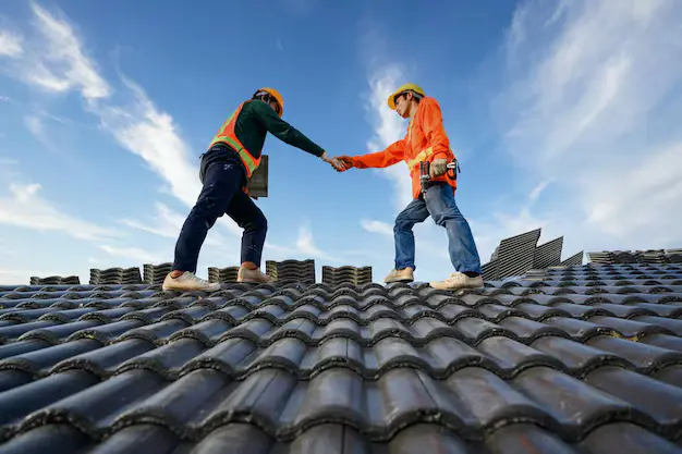 asian male roof repairman work together as team standing roof ceramic cement roof tiles construction site 140555 1228